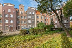Vonkajšia záhrada v ubytovaní Apartamenty Grobla III Q4Apartments