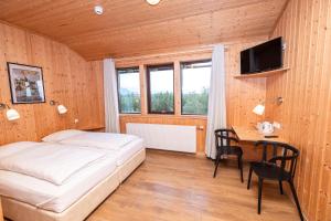 Postel nebo postele na pokoji v ubytování Árnanes Country Hotel + 37 fotografií