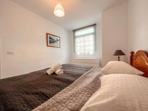 Posteľ alebo postele v izbe v ubytovaní Quiet Sunviet Stay, Pool & Morning Sun Balcony CS021