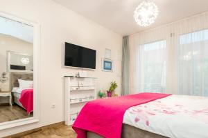 Posteľ alebo postele v izbe v ubytovaní Apartments Stella Mariela