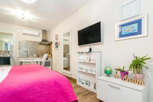 Posteľ alebo postele v izbe v ubytovaní Apartments Stella Mariela