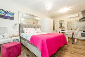 Kuchyňa alebo kuchynka v ubytovaní Apartments Stella Mariela