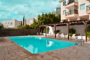 La alberca dentro o cerca de Eden Heights - Chlorakas Paphos - Sea View Luxury 2 Bed Apt By Yiota