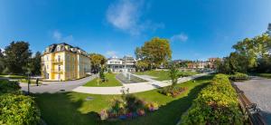 an aerial view of a house and a park at Hotel Allmer in Bad Gleichenberg