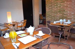 En restaurant eller et spisested på Hotel Galeria la Trinidad
