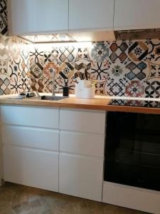 Kuchyň nebo kuchyňský kout v ubytování Appartamento Santa Rita Torino