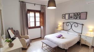 Postel nebo postele na pokoji v ubytování El Rancho Grande - Apartamento