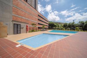 Bazén v ubytování Habitación en apartamento Robledo-Medellin nebo v jeho okolí