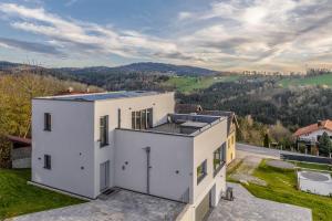 an aerial view of a white house at Moderne Villa mit Whirlpool und Heimkino in Waldkirchen