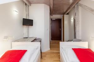 Posteľ alebo postele v izbe v ubytovaní Hotel Beskid