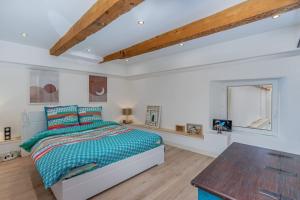 Posteľ alebo postele v izbe v ubytovaní Duplex 4 pers. centre avec cour privée ensoleillée