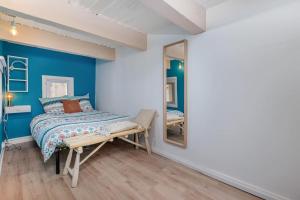 Posteľ alebo postele v izbe v ubytovaní Duplex 4 pers. centre avec cour privée ensoleillée