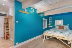 Posteľ alebo postele v izbe v ubytovaní Duplex 4 pers. centre avec cour privée ensoleillée