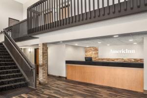 a view of the entrance to the americanith lobby at AmericInn by Wyndham Sauk Centre in Sauk Centre +58 photos