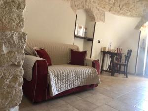 Postel nebo postele na pokoji v ubytování Trulli IsAgo + 30 fotografií