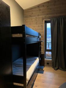 Eksklusiv, toppetasje leilighet med flott utsikt emeletes ágyai egy szobában