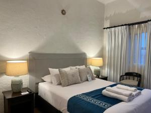 Cama ou camas em um quarto em Katari at Plaza de Armas Cusco