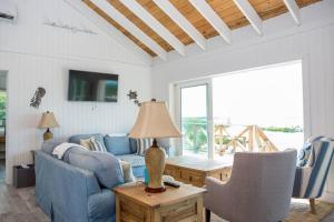 Televiisor ja/või meelelahutuskeskus majutusasutuses Sunset Cove
