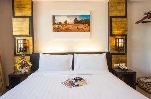 Postel nebo postele na pokoji v ubytování Crystal Inn