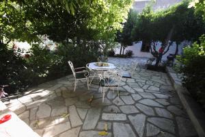 Vonkajšia záhrada v ubytovaní Mirto Apartments