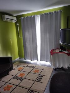 Ένα ή περισσότερα κρεβάτια σε δωμάτιο στο Apartamento 103 Praia do Ervino - SFS