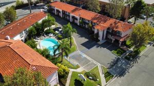 an overhead view of a house with a swimming pool at Hospitality Inn in San Bernardino