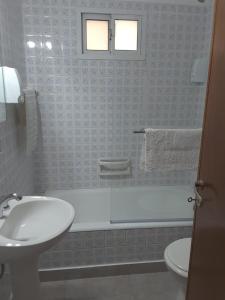 A bathroom at M&A Apartament Centro