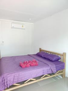 Postel nebo postele na pokoji v ubytování Koh Mook Sea View Bungalow
