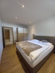 Posteľ alebo postele v izbe v ubytovaní Panorama Appartements Filzerhof