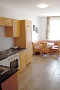 Kuchyň nebo kuchyňský kout v ubytování Hotel-Gasthof Restaurant Murblick