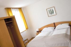 Postel nebo postele na pokoji v ubytování Hotel-Gasthof Restaurant Murblick