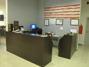 an office with an american flag on the wall at Motel Kobilj in Banja Luka