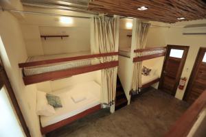 Postel nebo postele na pokoji v ubytování LaFinca Hostel Siargao + 15 fotografií