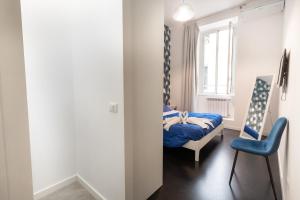 Łóżko lub łóżka w pokoju w obiekcie Trastevere four seasons Manara