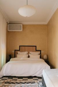 Postel nebo postele na pokoji v ubytování Riad Maison 24