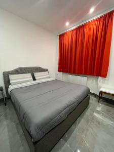 A bed or beds in a room at Casa del Credente