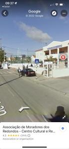a car is parked on the side of a street at Summer holiday in Fernao Ferro
