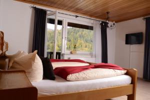 Postel nebo postele na pokoji v ubytování Hotel Großbach