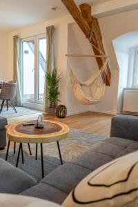 Posezení v ubytování Ferienwohnung "Zugspitze" - 95qm Maisonette in Mering Zentrum