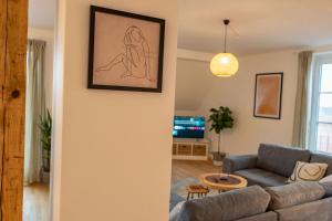 Posezení v ubytování Ferienwohnung "Zugspitze" - 95qm Maisonette in Mering Zentrum