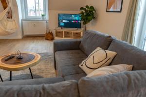 Posezení v ubytování Ferienwohnung "Zugspitze" - 95qm Maisonette in Mering Zentrum
