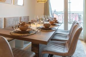 Posezení v ubytování Ferienwohnung "Zugspitze" - 95qm Maisonette in Mering Zentrum