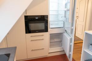 Kuchyň nebo kuchyňský kout v ubytování Ferienwohnung "Zugspitze" - 95qm Maisonette in Mering Zentrum