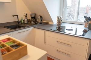 Kuchyň nebo kuchyňský kout v ubytování Ferienwohnung "Zugspitze" - 95qm Maisonette in Mering Zentrum