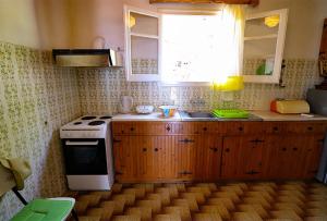 Kuchyň nebo kuchyňský kout v ubytování Antigone Apartments