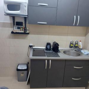 Kuchyň nebo kuchyňský kout v ubytování APARTMAN POZORISTE Penthaus