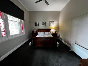 Ένα ή περισσότερα κρεβάτια σε δωμάτιο στο Skibo Cottage