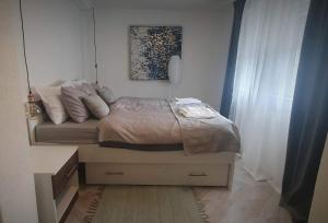 Postel nebo postele na pokoji v ubytování Apartman Incerum