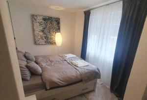 Postel nebo postele na pokoji v ubytování Apartman Incerum