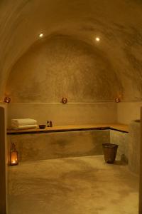 a bathroom with a counter and a sink in a room at Riad RK Suites & Spa in Marrakesh